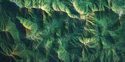 Lush Green Mountain Range Aerial View Nature Texture Background photo