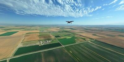 Aerial View of Drone Flying Over Vast Green Agricultural Fields and Farmland Under Clear Blue Sky with White Clouds in Background photo