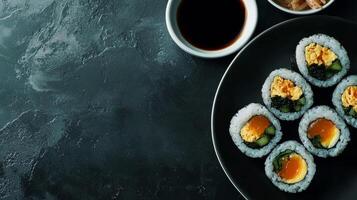 Delicious Gimbap Sushi Rolls with Kimchi Soy Sauce photo