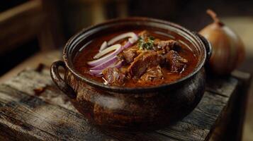 Aromatic Lamb Curry in Clay Pot Rustic Indian Cuisine Spicy Food photo