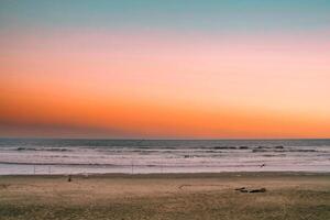 Beautiful beach and sea with sunrise sky photo