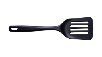 Black nylon slotted spatula with ergonomic handle image isolated transparent, . Practical kitchen tool cut out . Versatile cooking utensil cutout element object photography png