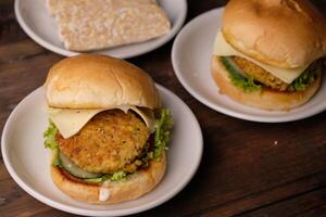 burger tempeh. low carbohydrate vegan tempeh burger. healthy food. suitable for weight loss and diet photo