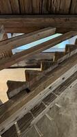 Antique wooden staircase with steps in the Medieval knight's castle, Siedlicin tower in Poland, Silesia. photo