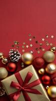 Red and Gold Christmas Arrangement with Gift Box and Baubles on Red Background. Elegant, Festive Christmas Banner, Template, Copy Space, Social Media Post photo