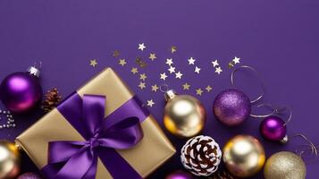 Purple and Gold Christmas Arrangement with Gift Box and Baubles on Purple Background. Elegant, Festive Christmas Banner, Template, Copy Space, Social Media Post photo
