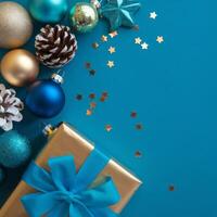 Light Blue and Gold Christmas Arrangement with Gift Box and Baubles on Light Blue Background. Elegant, Festive Christmas Banner, Template, Copy Space, Social Media Post photo