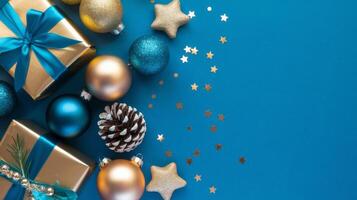Light Blue and Gold Christmas Arrangement with Gift Box and Baubles on Light Blue Background. Elegant, Festive Christmas Banner, Template, Copy Space, Social Media Post photo