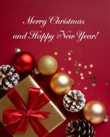 Red and Gold Christmas Arrangement with Gift Box and Baubles on Red Background. Elegant, Festive Christmas Banner, Template, Copy Space, Social Media Post photo