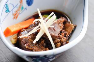 beef soup or beef stew with vegetable photo