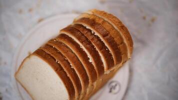 Bread Slices on plate, Bread Slices on table photo