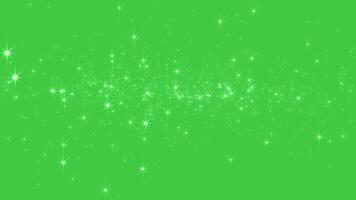 Abstract glowing particles of shiny fairy twinkling stars and swirl and fly glitter. The magic of flying shiny sparkle. Chroma key - Green screen. Background for holidays, New Year and Christmas video