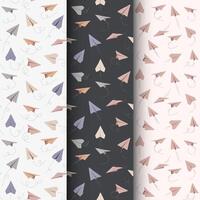 Seamless patterns with hand drawn paper airplanes. Symbol of travel and route vector