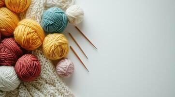 Knitted things, a skein of yarn with knitting needles, created using technology. photo