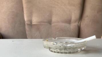Smoky habit captured in a casual setting with an ashtray video