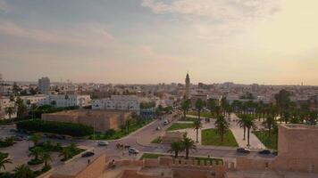 Park and Great Mosque view to the road in Monastir city in Tunisia. video