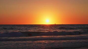 Sunset Over Pacific Ocean with Distant Ship at Venice Beach video