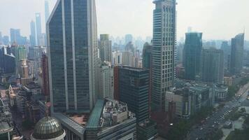 A sweeping view of Shanghai's skyline with modern skyscrapers and the iconic Shanghai Tower, capturing the city's vibrant urban architecture. video