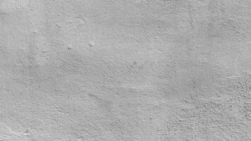 Old cement wall with beautiful pattern in retro concept. Concrete background for wallpaper or graphic design. Blank plaster texture in vintage style. Modern house interiors that feel calm and simple. photo