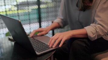 A close-up shot of a person hands typing on a laptop, showcasing the dedication and focus required for productivity.The soft lighting creates a serene atmosphere. video