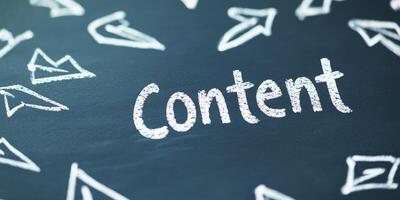 Arrows pointing to the word Content. Blackboard background with white chalk drawing arrows and text. photo
