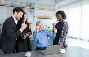 Simple meeting of small business owners, using their home as a workplace, talking and consulting with fun and smiles. photo