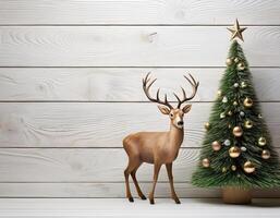 Deer with christmas tree on a white wooden background copy space. reindeer. photo