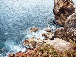 Beautiful atmospheric view on rocks and the Atlantic ocean photo