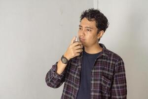 Man Applying Cologne photo