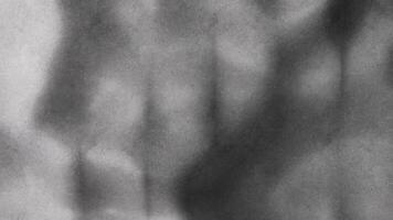 Abstract, animated industrial-style concrete background with irregular, organic textures and shadowy patterns. Raw industrial aesthetic, ideal for modern, minimalistic, or architectural projects. 3D. video