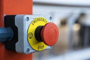 Emergency button in technical production photo