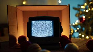 television with noise interference into Christmas box video