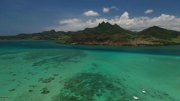 Beautiful view from the bird's eye view of the mountains and the waves of the Indian ocean in Mauritius. video