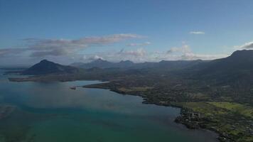 Aerial view of mountains on the coast of Mauritius island video