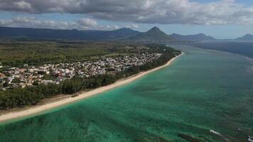 bird's eye view of a suburb with a beautiful white beach on the island of Mauritius video