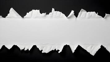 White ripped paper strips with torn edges isolated on a black background, perfect for design overlays photo