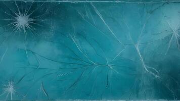 Scratched ice texture with a teal blue overlay, creating an aged glass effect with dust particles. photo