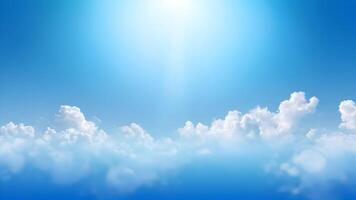 Blurry blue sky with soft, hazy clouds creating a smooth gradient, perfect for backgrounds with copy space. photo
