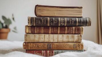 Vintage Bookstack with Textured Covers on Soft Background photo