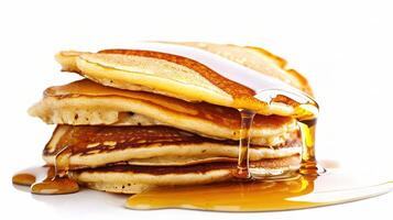 Delicious Stack of Pancakes Drizzled with Maple Syrup photo