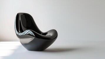 Sleek Modern Black Chair with Unique Design and Curved Shape photo