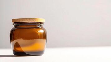 Classic Brown Candle Jar with Wooden Lid on White Surface photo