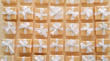 Many Gift Boxes with White Ribbons on a Soft Background photo