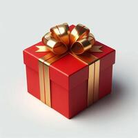 A gift box wrapped in red paper with a gold ribbon, displayed on a white background photo