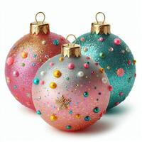Three colorful Christmas baubles with glitter, isolated on a white background photo