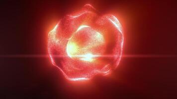 Abstract red particles creating a swirling luminous sphere shape against a dark background with a bright central glow resembling fire or plasma background video