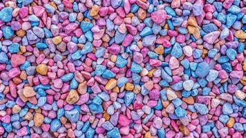 Colorful pebbles on the ground photo