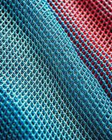 Close up of a blue and red mesh fabric photo