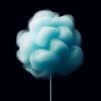 Blue cotton candy, reminiscent of a fluffy cloud, on a stick against a dark background, evoking simplicity and nostalgia. photo
