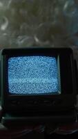Santa Claus Holds Static Television Signal In Front Of Christmas Tree video